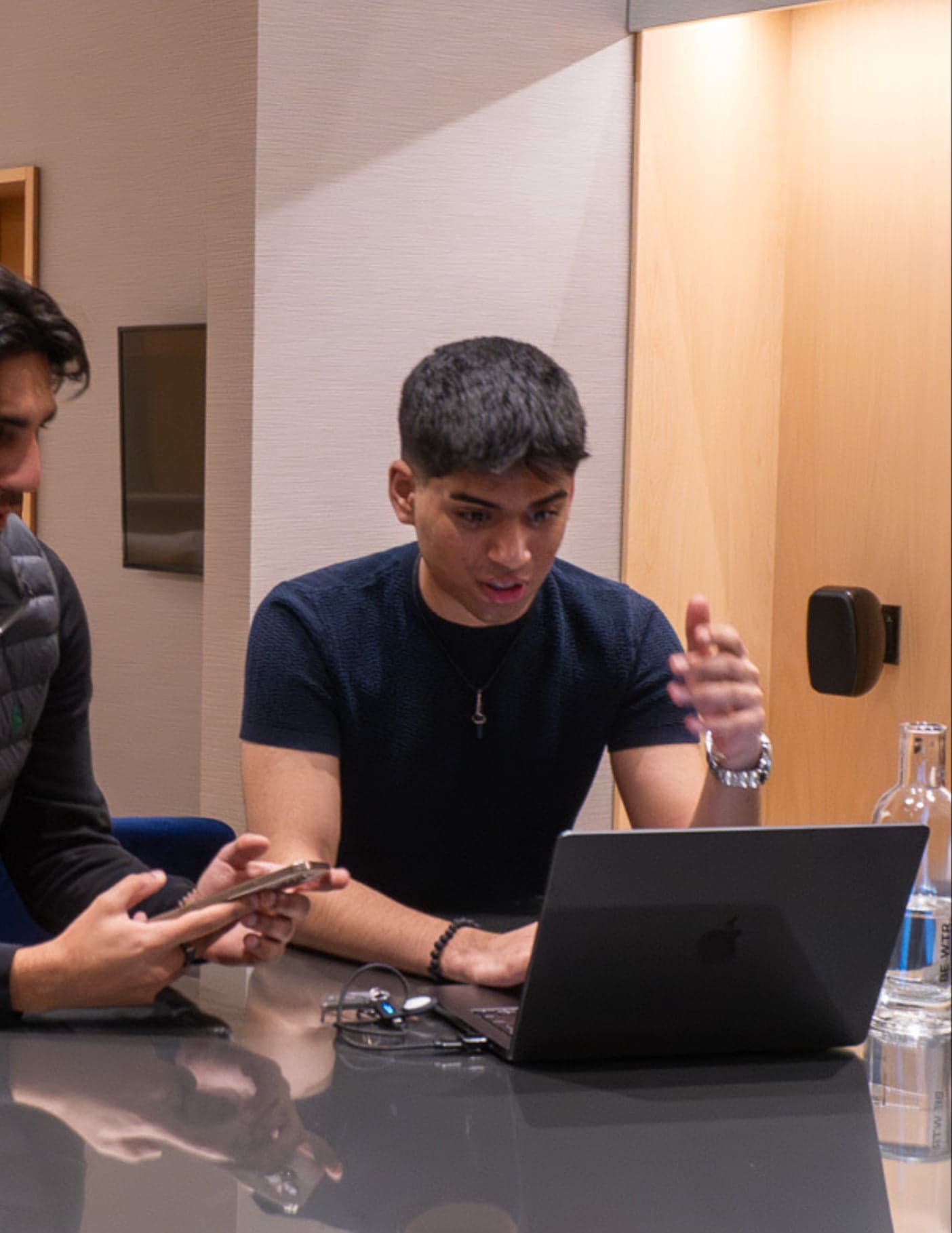 Aleem Rehmtulla — Founder of May Inc. working at a desk
